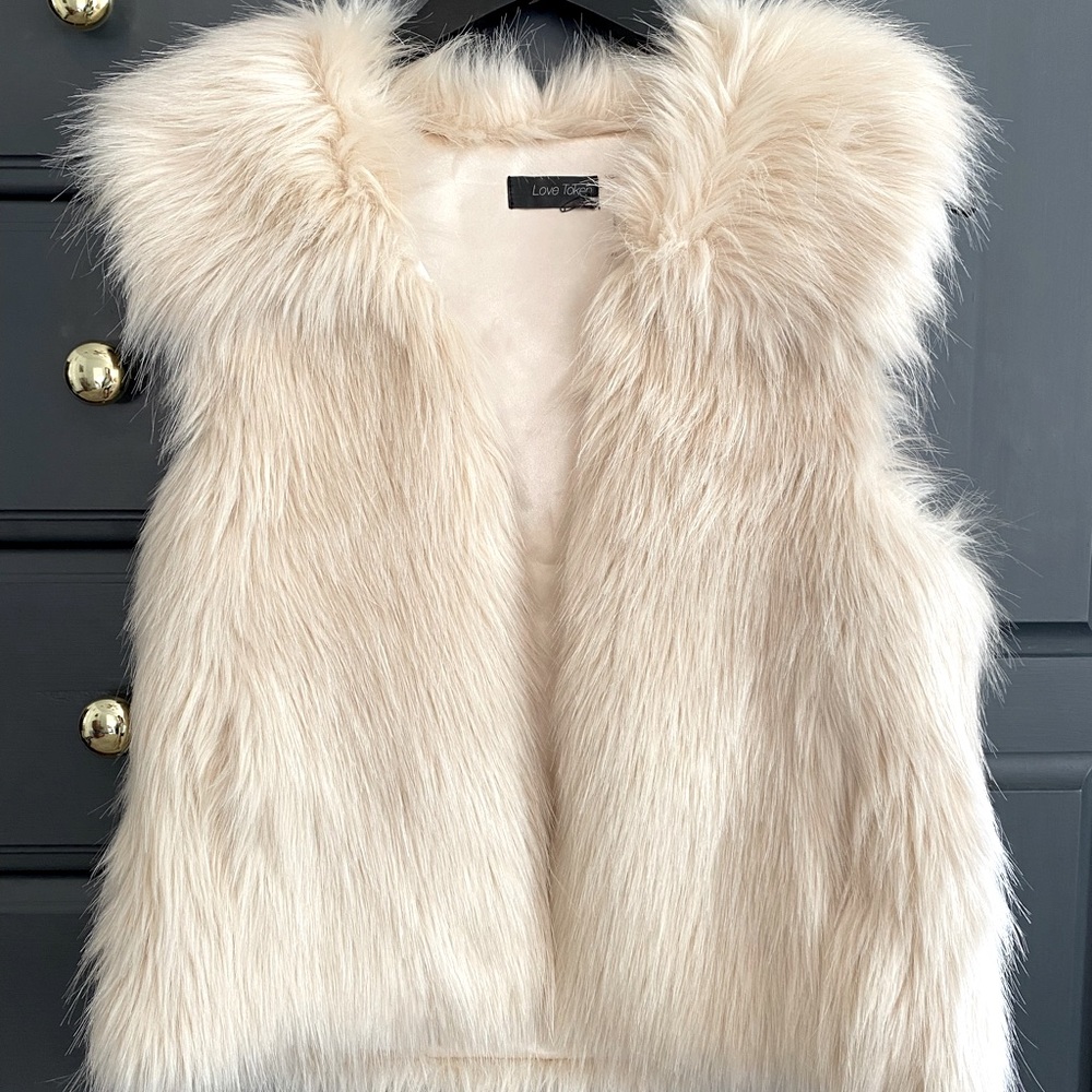 Cream colored faux fur vest